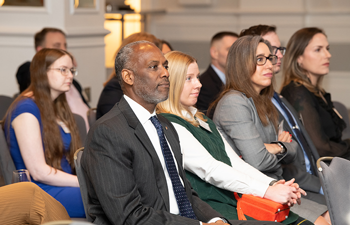Guests listen to the guest speaker on April 26.